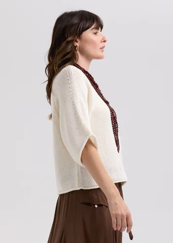 Model wearing white Textured Jumper By LD + CO Available at Beetees Nelson